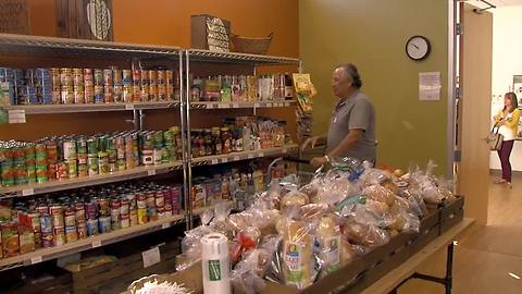 Food pantry designed to look like grocery store