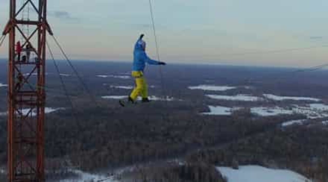 Daredevil slacklines between Russia's highest tower