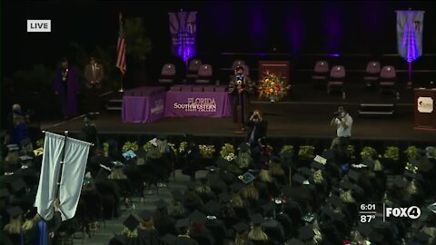 Students celebrating graduation in person