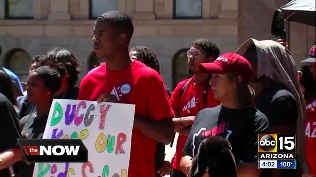 Protesters rally against family separation at border outside of Ducey's office