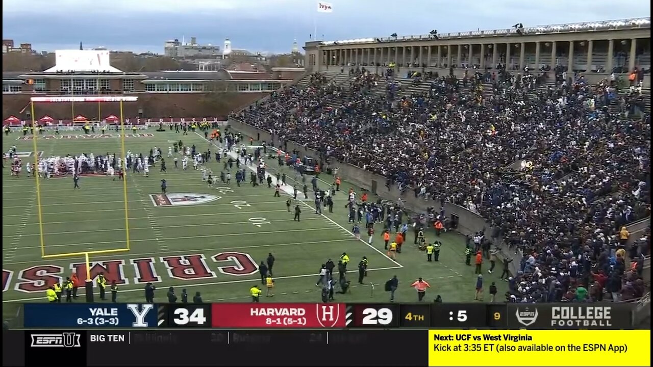 Yale fans rush Harvard’s field after Yale beats Harvard