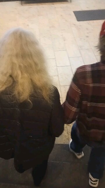 grandparents holding hands