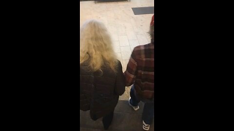 grandparents holding hands