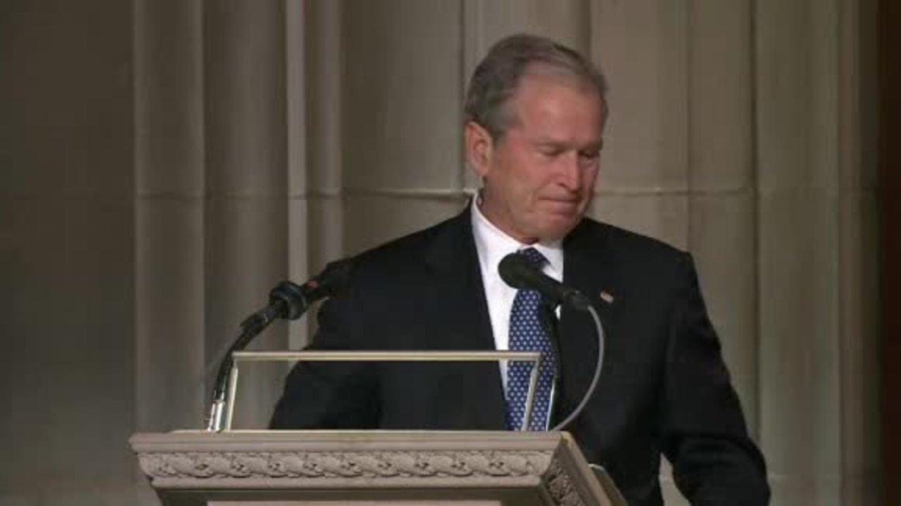 Former President George W. Bush honors father in emotional tribute