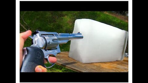 .44 magnum revolver shot on ice block