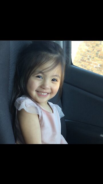 Little girl Singing like a bird in the car