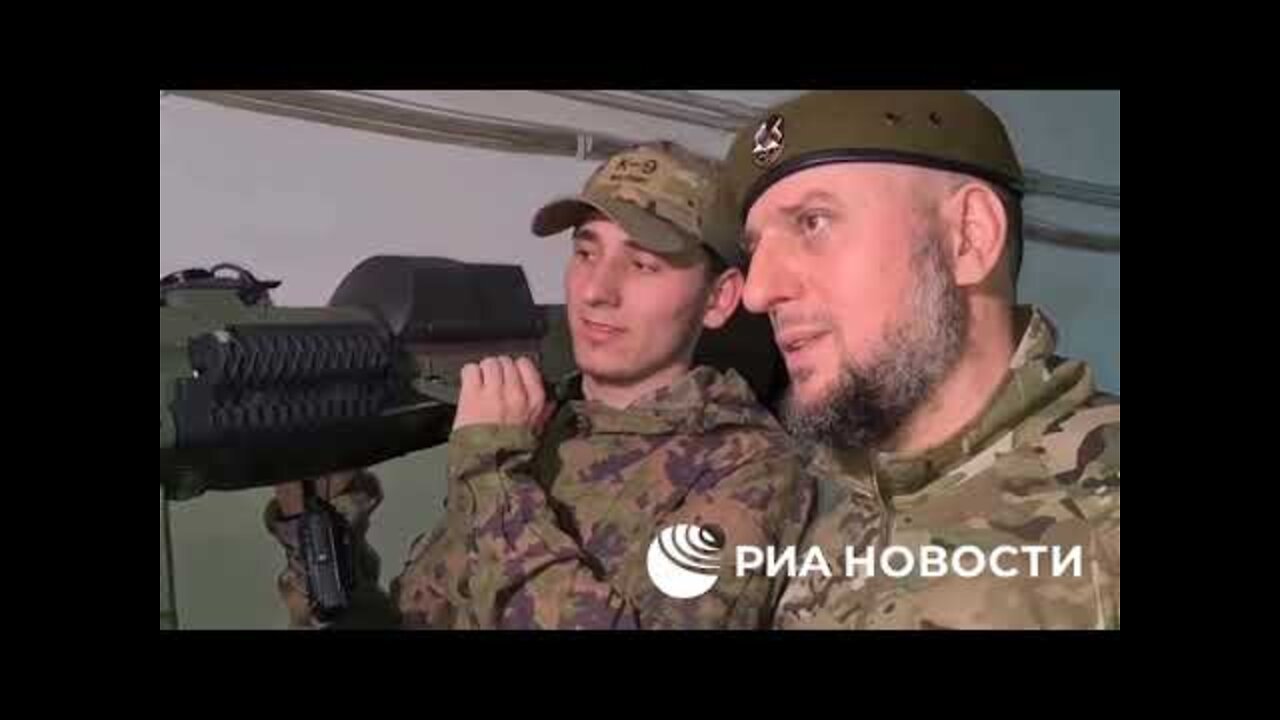A large cache of captured weapons is shown by assistant to the head of Chechnya Alaudinov