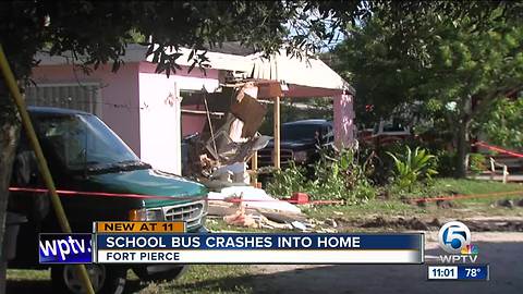 Vehicle crash sends school bus into Fort Pierce house