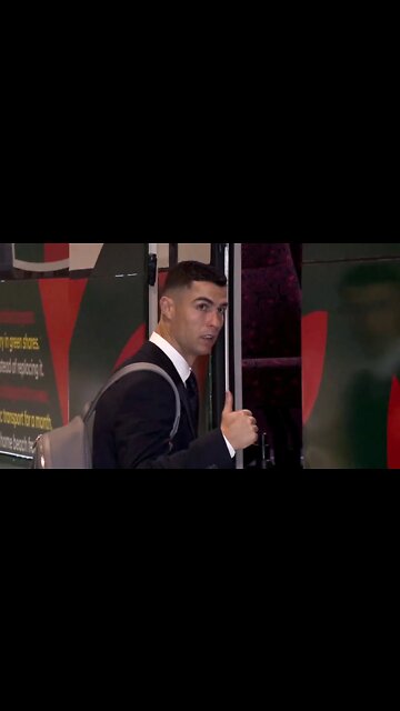 Ronaldo gives a thumbs-up before boarding Portugal team bus to World Cup hotel
