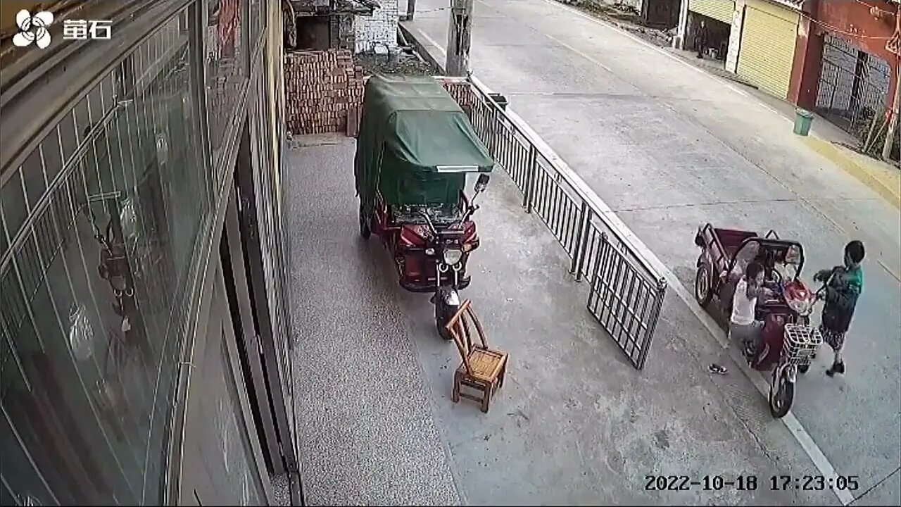 Kid accidently crashes in house on a tricycle