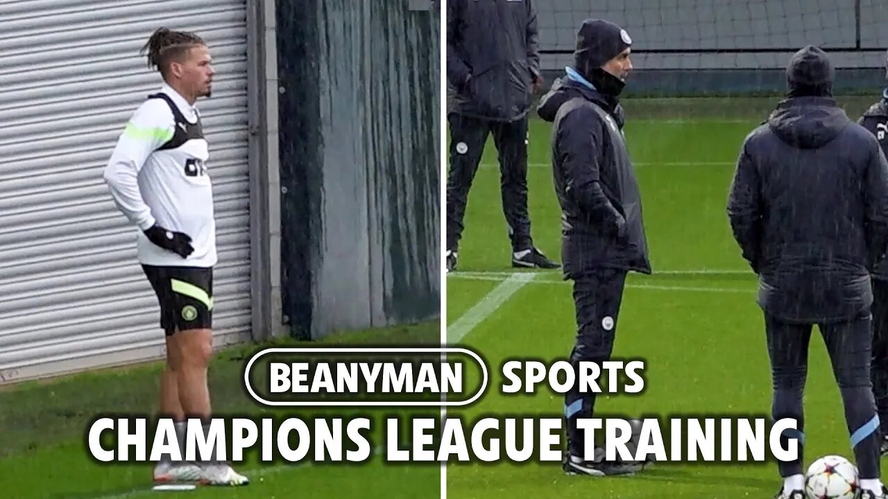 Manchester City train in VERY rainy conditions ahead of their Champions League match against Sevilla