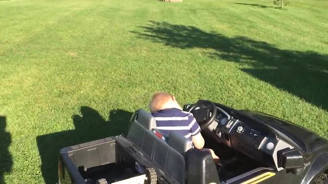 "Toddler Boy Falls Asleep While Driving Power Wheels"