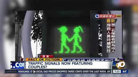 Traffic signal man gets a girlfriend?