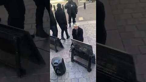 Absolute CLOWN: White woman kisses feet of black men.