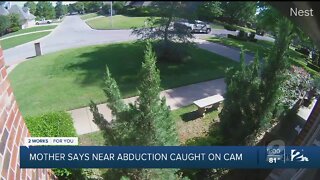 Mother says near abduction caught on cam