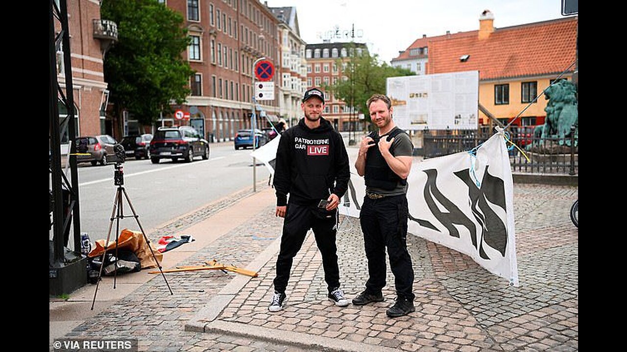 Women tries to stop Quran from burning but Police return Quran to Patrioterne GAR, Denmark.