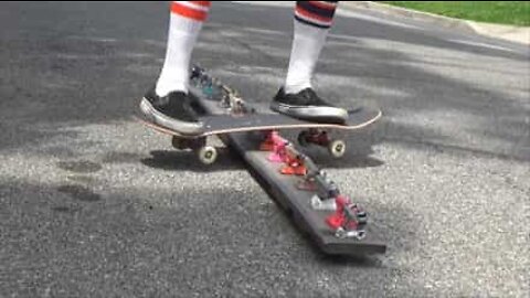 Skater grinds on skateboard parts