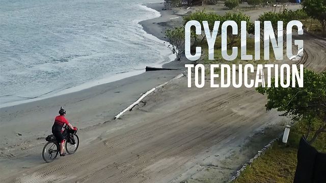 A kid's right to school is in this cyclist's hands