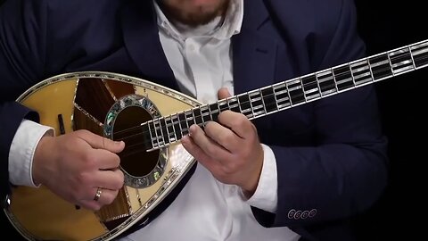 Michael Paouris- fastest bouzouki player