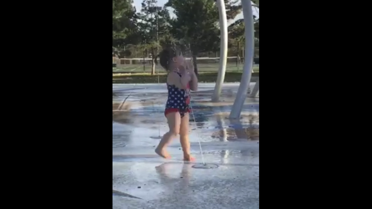 Water fountain blasts little girl right in the face