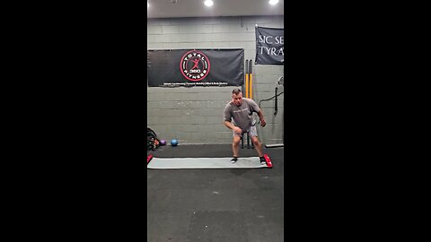 Slide Board/Kettlebell Swing Superset