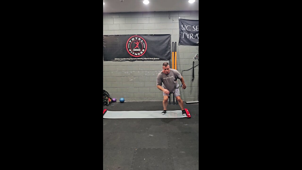 Slide Board/Kettlebell Swing Superset