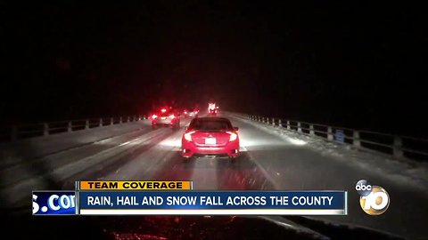 Rain, snow and hail fall across San Diego county