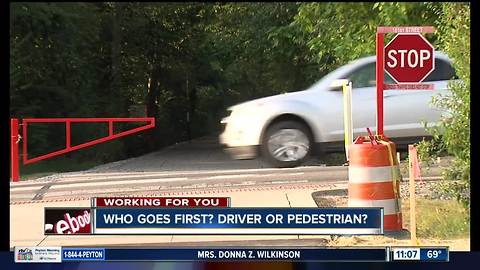 Who stops at Monon crosswalk? Pedestrians or vehicles?