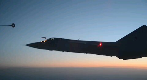 In-flight refueling of the MiG-31 "Foxhound" interceptor fighter at dusk