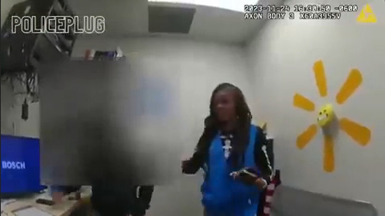 Police confront Walmart employee after she is caught on video stealing from the register