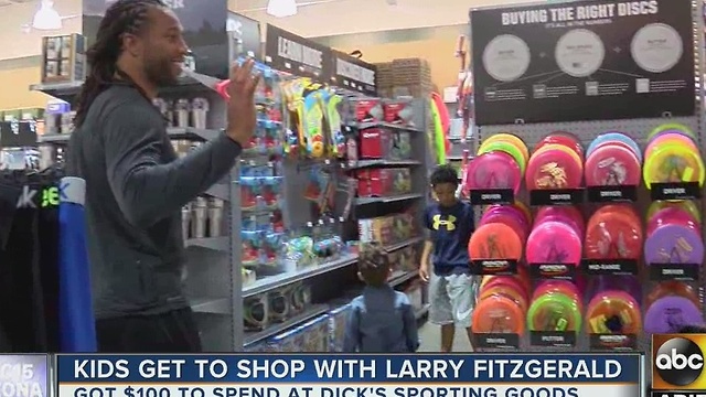 Arizona Cardinalsâ Larry Fitzgerald gives kids shopping spree