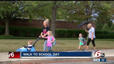 Rainy weather cancels Walk to School Day for many students, parents