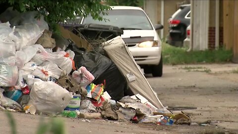 Resident in Park Hill angered by mounds of trash in neighborhood alley