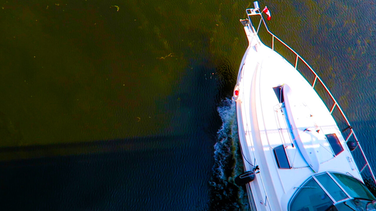 Yachts cruise under Flora Footbridge - Ottawa, Canada