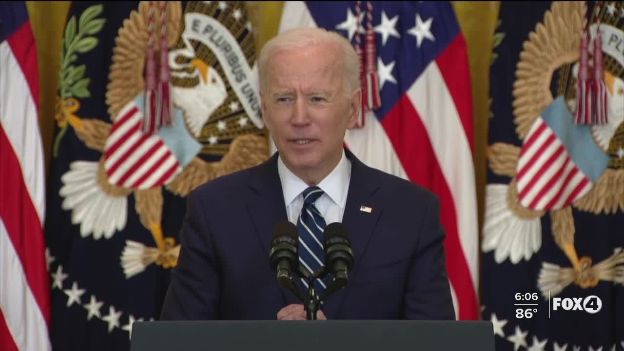 Biden defends his administration's immigration policy, sets new vaccination goal in first presser