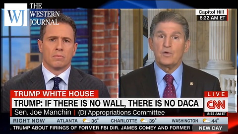 Watch: CNN's Chris Cuomo Does Not Look Happy When Sen. Joe Manchin Says 'We Need A Wall'