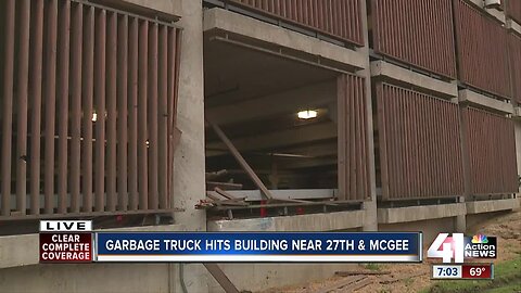 Hallmark parking garage damaged in dumpster truck crash