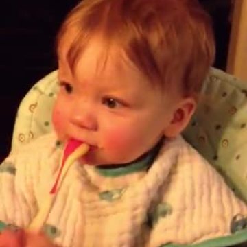Toddler teaches his baby sister how to roar