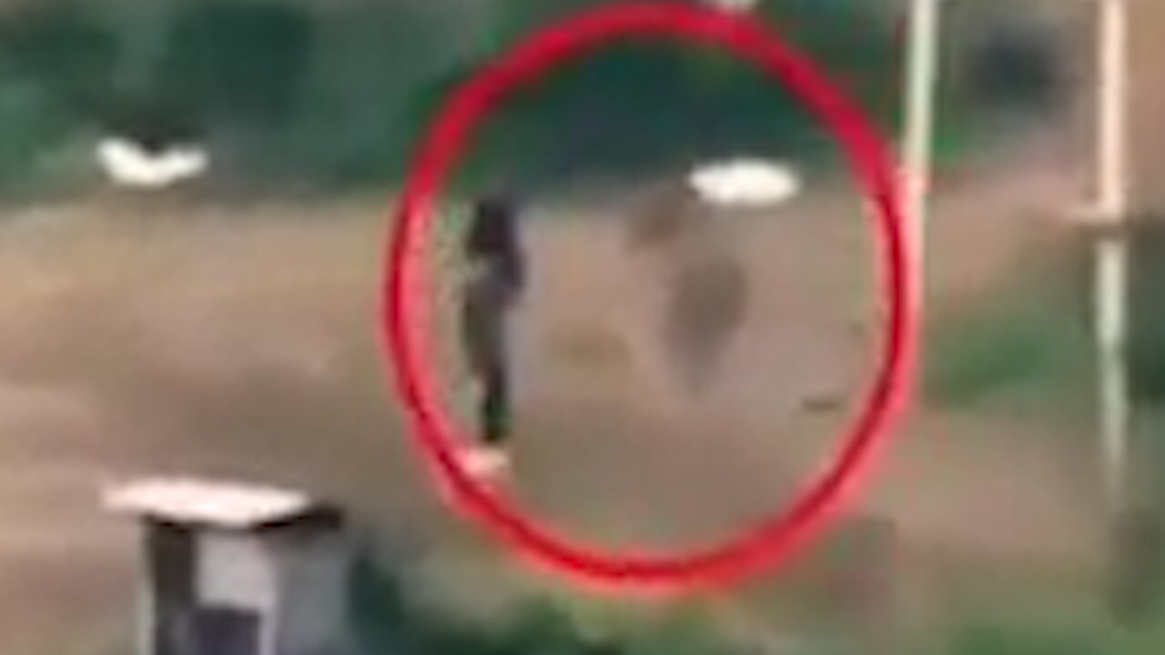 Black shadow haunts goalkeeper during soccer game with children [Ghost]