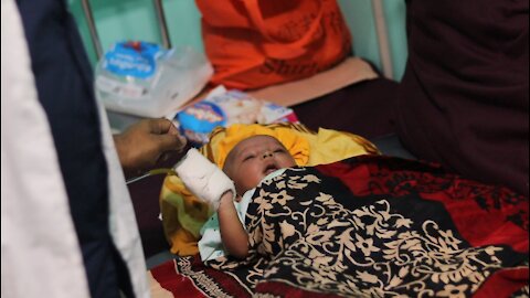 Baby Crying in Hospital Bed