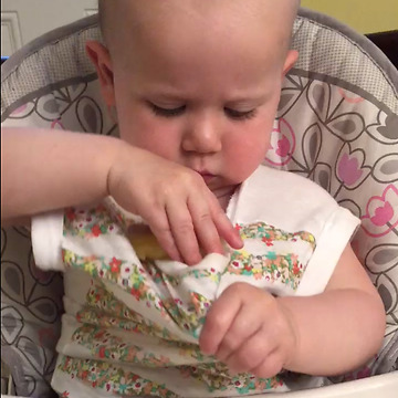 Serious Snacker Baby In Action