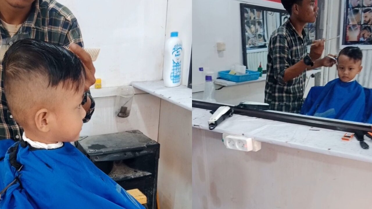 little boy getting his hair cut