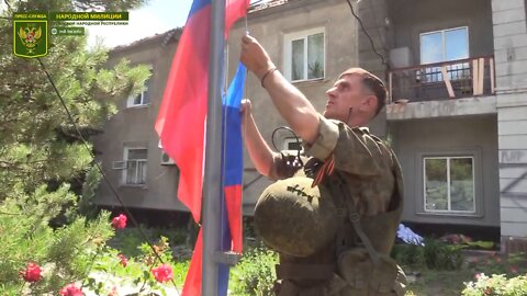 Flags raised in Gorskoye: Russia, Luhansk People's Republic and Prizrak Brigade