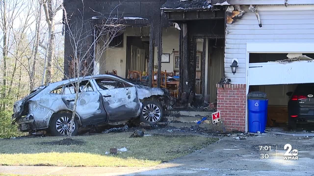 Fire erupts after SUV crashes into home in Middle River