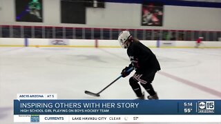 Girl plays hockey on Brophy team