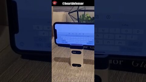 Bluetooth virtual keyboard with a phone stand