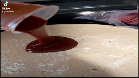 Cooking A Homemade Pizza With BBQ Sauce