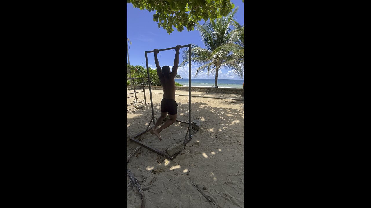 Pull-ups at Nai Harn Beach Phuket Thailand