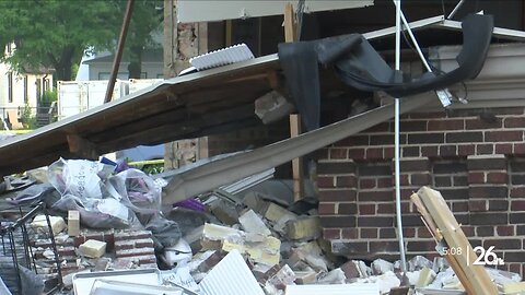 Main Street car crash causes partial building collapse