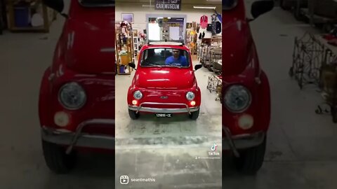 Driving the tiny Fiat 500 into the museum